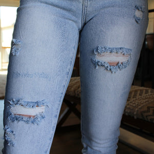Connor Frayed Ankle Skinny Jeans